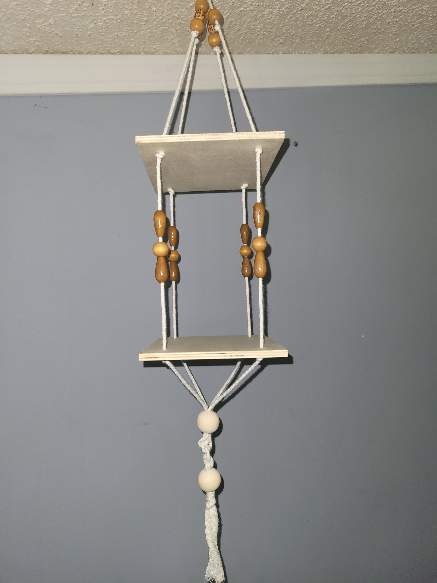 Boho style hanging shelf